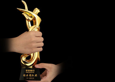 Poly Resin Material Award Cups Trophies With Abstract Figure Design